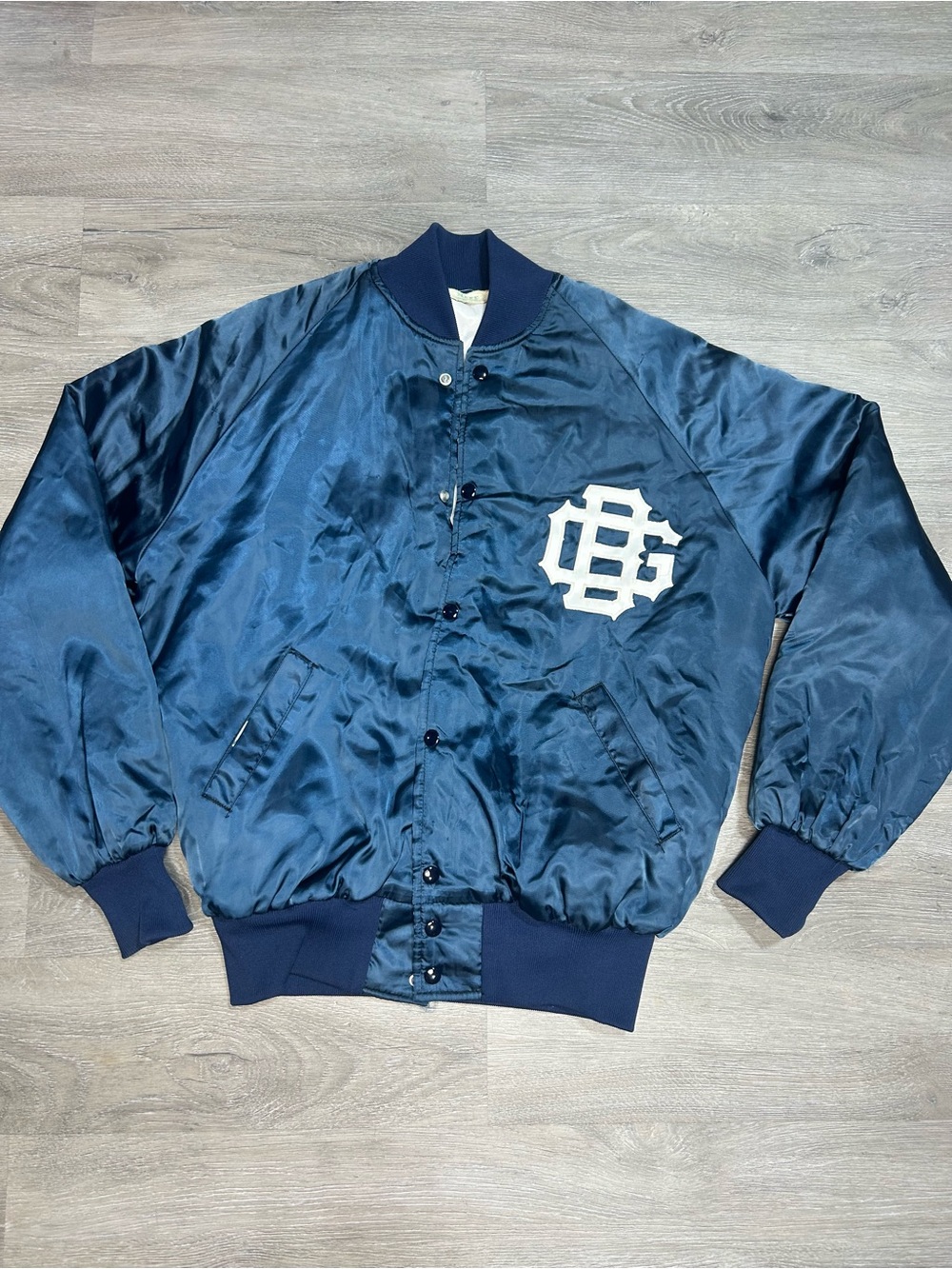 Vintage satin blue quilted bomber jacket with C & B logo by NEFF Sz L
